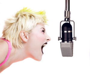 girl shouting to the microphone