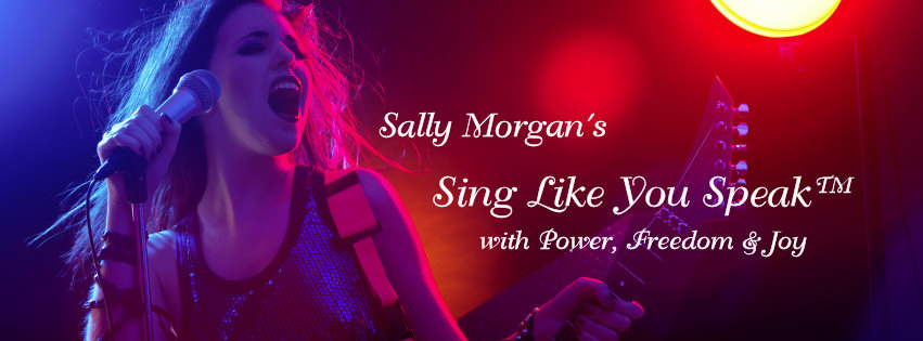 Sally Morgan's Sing Like You Speak logo. Woman singing playing guitar on stage.