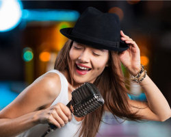 girl with a hat singing